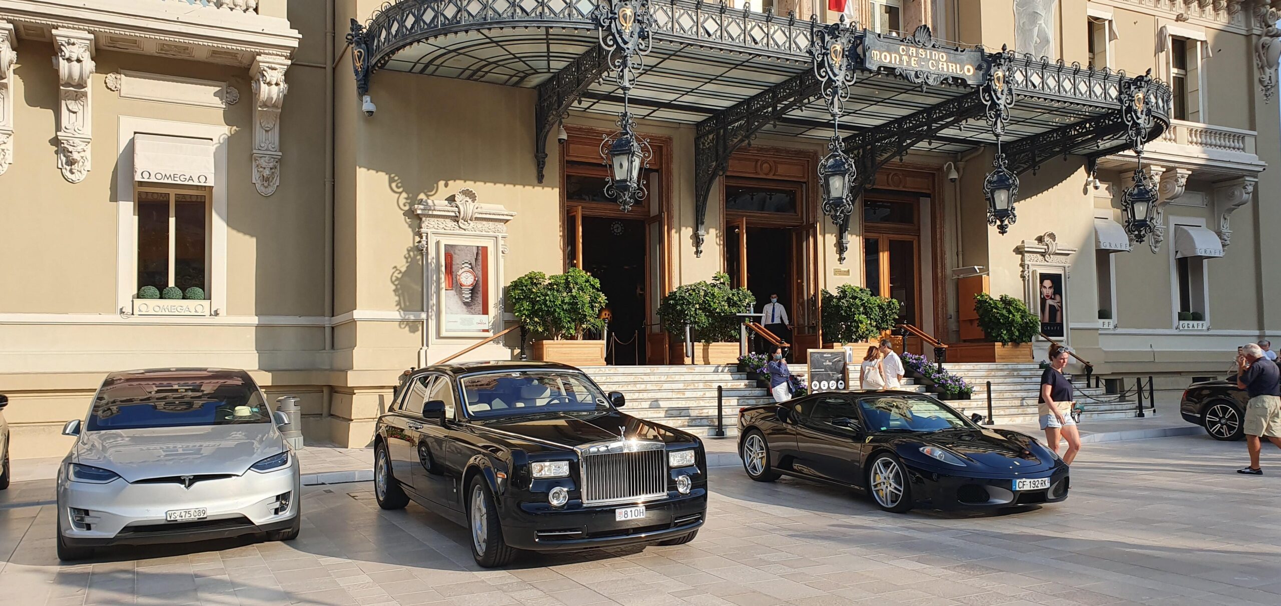 luxury car front of casino